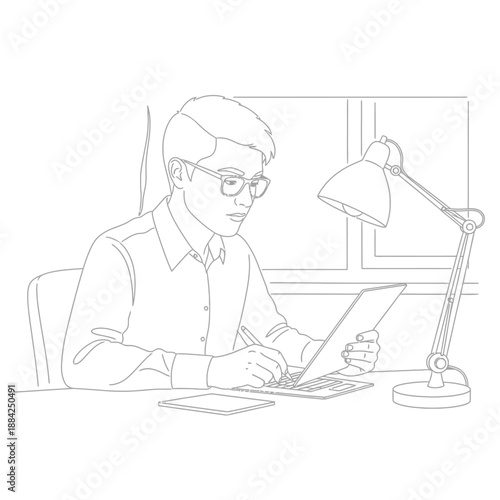 Man working on laptop and paper at desk with lamp