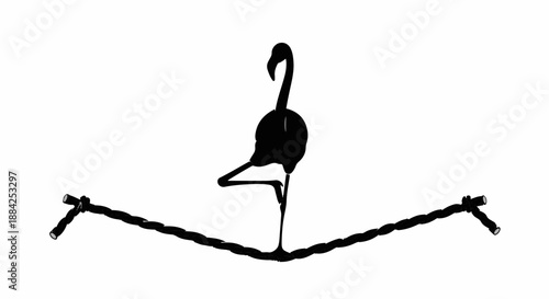 Elegant flamingo balances gracefully on a minimalist wire structure