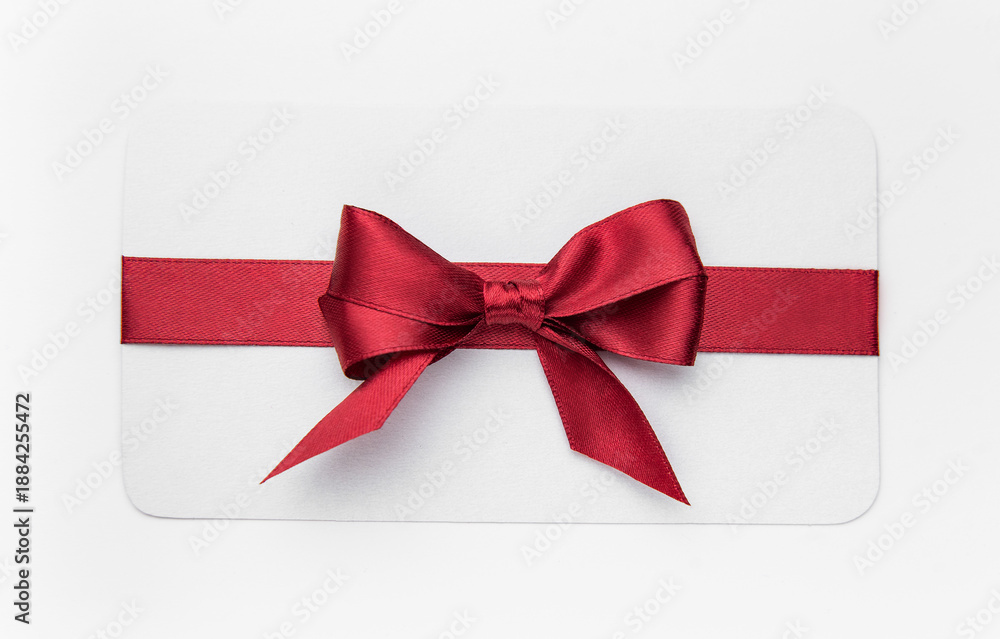 Fototapeta premium Blank gift card with red satin ribbon bow