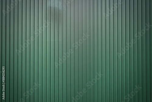 a vertical green metal surface