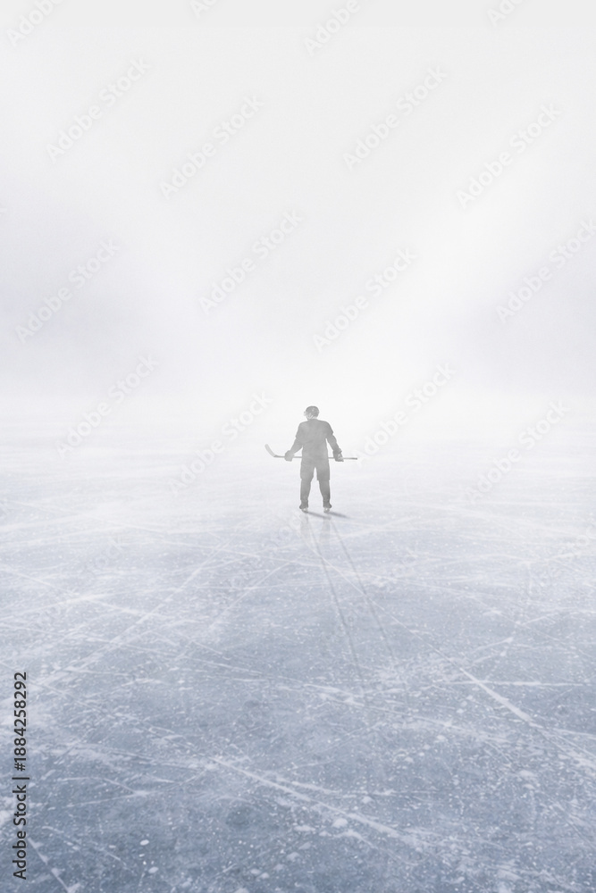 Fototapeta premium Clean composition of hockey player standing on empty ice arena. Concept of calm before competition, mental preparation, focus training moment, minimal sport background.