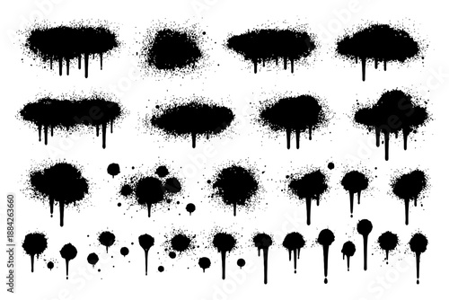 Set of grunge spray paint drips and splatter in various shapes.