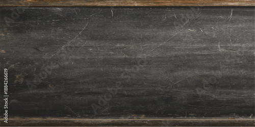 A dark and weathered vintage chalkboard rests against a textured grunge concrete wall, featuring an aged black surface with a dusty pattern of chalk and a blank wooden frame