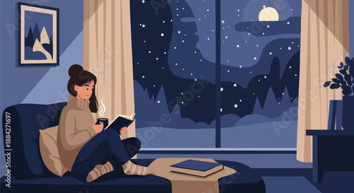 Cozy young woman relaxing indoors reading a book while enjoying a warm beverage on a snowy night