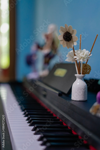 Minimalist Flower Vase on Piano Keys with Soft Focus Background