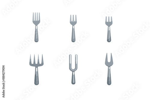 Collection of six different types of forks and carving forks on a white background
