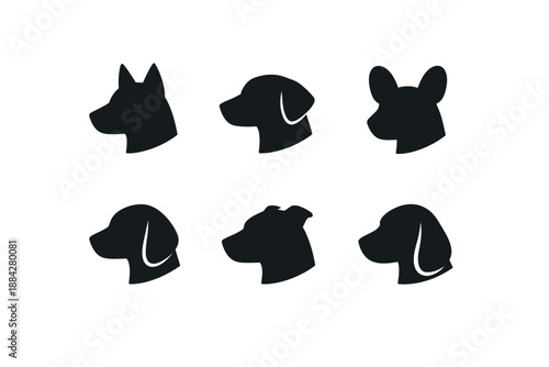 Collection of diverse dog head silhouettes in profile view, vector art