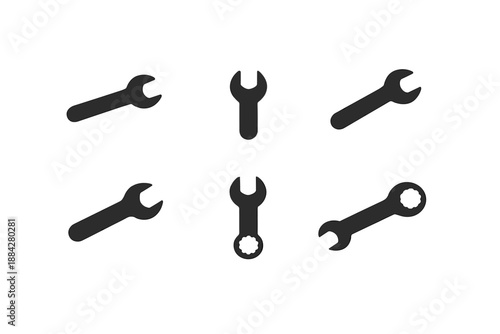 Collection of six dark grey wrench icons on a white background, arranged in two rows