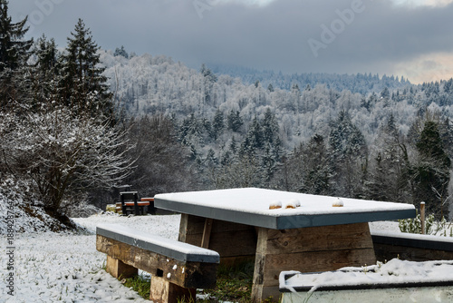 Wallpaper Mural snow covered picnic table in winter mountain landscape Torontodigital.ca