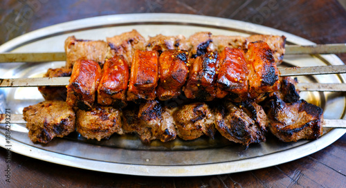 Grilling Tasty Dish Barbecue. Cooking On Picnic On Charcoal Souvlaki Food Metal Skewer Beef. Street Food Grill. Grilling Marinated Shashlik Souvlaki. Grilled BBQ Meat On Fire. Roasting Meat Bbq .