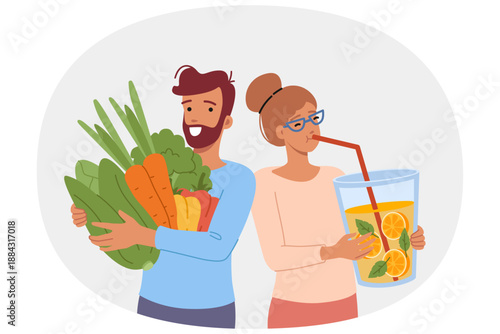 Vegan man and woman are passionate about raw food diet, and keep fresh juice or organic vegetables. Two vegans or vegetarians enjoying life and taste of healthy, fat-free ingredients