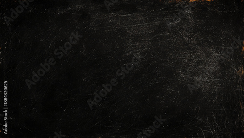 Scratched black surface with scratches and marks