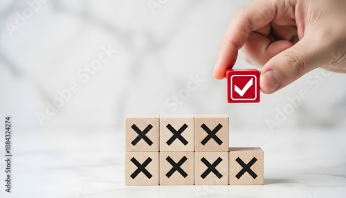 Wallpaper Mural Hand placing a checkmark on wooden blocks with x's Torontodigital.ca