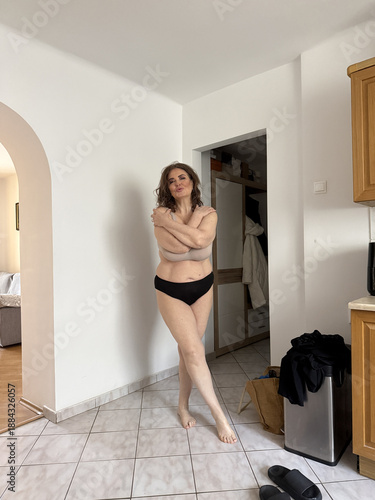 woman's physique and health awareness. The subject, aged between 40 and 50, general health monitoring for mature women. healthy, average body