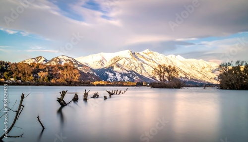 Scenic Lake Wakatipu with Snow-Capped Mountains in Queenstown, New Zealand.