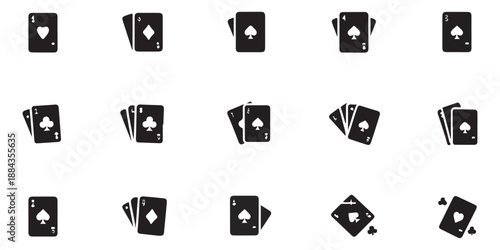 Set of solid icons featuring playing cards showing aces card stacks and game elements