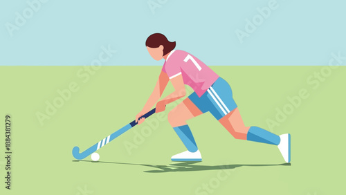 Female field hockey player in action on a green field.