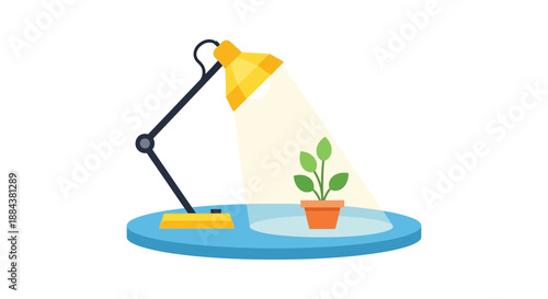 Small potted plant growing under a bright desk lamp, symbolizing growth and care.