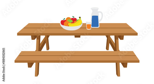 Simple wooden picnic table set for a meal with fruit and drinks outdoors