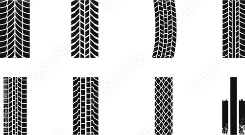 Black tire tread patterns collection with diverse designs on transparent background silhouette