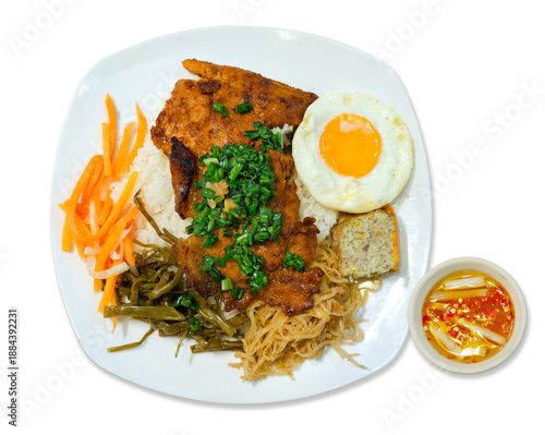 Vietnamese combination broken rice. Cơm Tấm Sườn Bì Chả. Vietnamese Broken Rice is served with grilled pork. Com tam suon bi cha. Broken rice with grilled pork chop, meatloaf and shredded pork skin. 