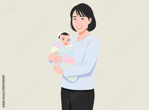 smiling Asian mother holding her swaddled newborn baby in a colorful blanket. A heart warming scene representing motherhood, parenting, love, and infant care.