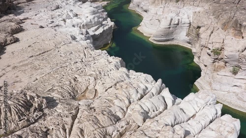 Aerial View of a Canyon on Socotra Island, Yemen, Highlighting Unique Rock Formations and Turquoise Waters