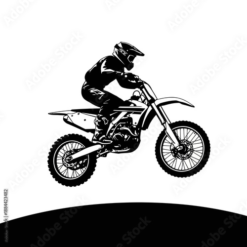 Dynamic motocross rider performing a jump