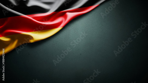 German Flag Colors, Black, Red, and Yellow Fabric on Dark Background