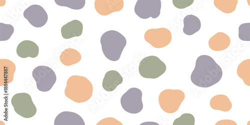 A colorful abstract pattern of irregular shapes in various muted earthy tones on a white background