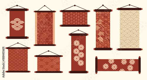 Set of traditional Japanese paper scrolls with various red and tan patterns like waves and floral motifs.