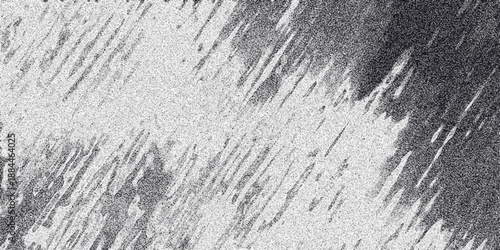 Abstract grayscale texture with diagonal streaks and a grainy effect, resembling rain on a window or distressed metal, offering a moody and atmospheric visual for backgrounds and artistic compositions