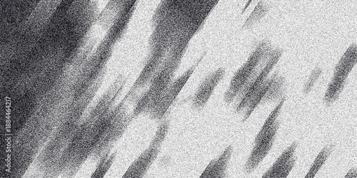 Dynamic diagonal abstract pattern in grayscale with streaks of noise and granular texture, suggesting motion or blurred light for creative backgrounds