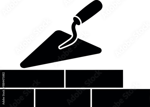 Trowel and Brick Wall Icon for Construction and Masonry