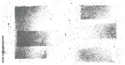 Abstract grey spray paint splatters and rectangular shapes on a white background creating a textured distressed effect