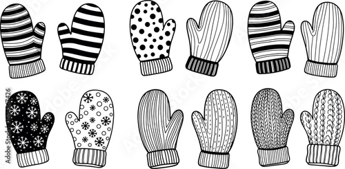 Collection of various patterned and colored mittens on white background