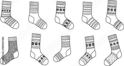 Collection of various patterned socks on white background