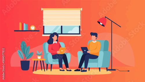 Two people sit in armchairs using laptops with a lamp and plants in a room