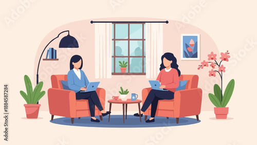 Two women working on laptops while sitting in cozy armchairs