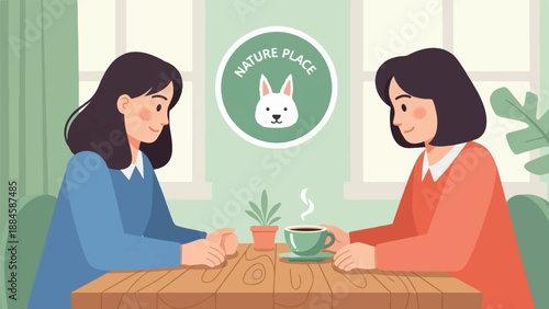 Two women sitting at a table with a coffee and a plant