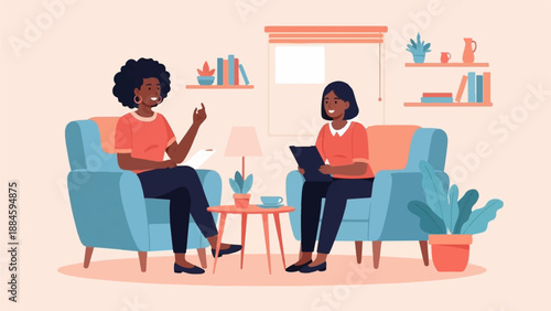 Two women conversing in cozy chairs in a home office setting