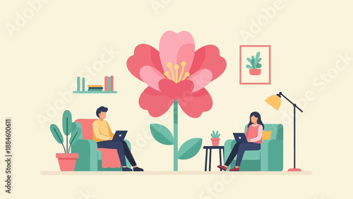 Two people sit on sofas in a room, each working on a laptop, with a large flower