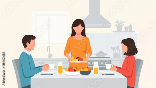 People eating fruit in a kitchen