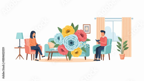 Two people reading in chairs by a sofa with a large bouquet of flowers
