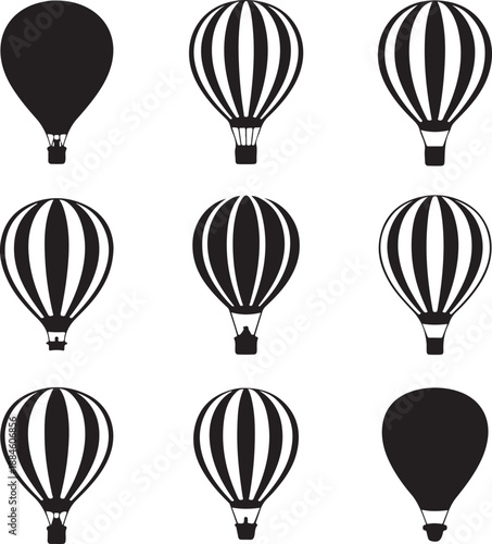 set of black and white hot air balloons flying high