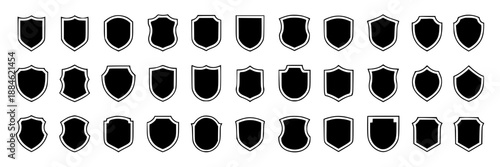 Collection of 36 black shield icons in outline and solid fill styles, arranged in neat rows on a white background.