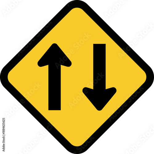 Yellow Diamond Road Sign with Black Up and Down Arrows Symbolizing Two Way Traffic or Exchange