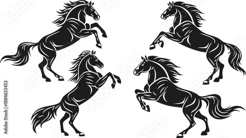Majestic black horses rearing, showcasing strength and grace. The image captures the powerful stance of horses