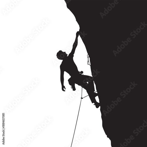 Silhouette of a person rock climbing on a cliff with a rope