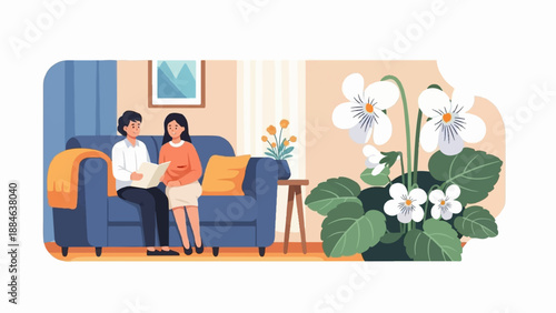 Two people sit on a sofa reading, near white flowers